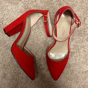 Red pointed heels